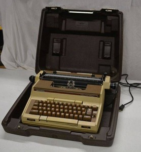 lot 245 image: Smith Corona Electric Typewriter and Case