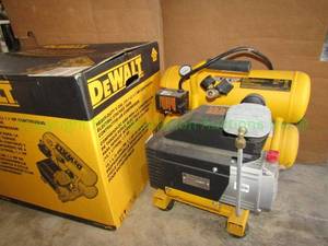 lot 2 image: Dewalt 4 gallon contractor air compressor