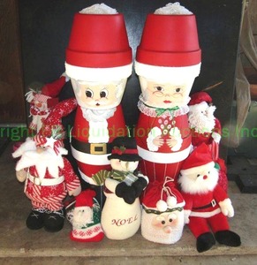 lot 19 image: Christmas decor as shown including custom flower pot Mr & Mrs Clause