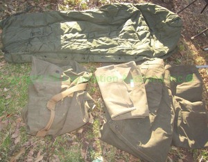 lot 13 image: Military issue sleeping bag, canvas tarp and more as shown