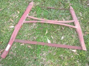 lot 9 image: Vintage wood handle bow saw