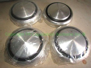lot 289 image: Retro aluminum hub caps