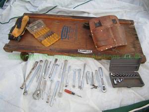 lot 297 image: Sears Craftsman tools including wrenches, ratchet drive, auto creeper and more