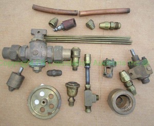 lot 233 image: Assorted brass and copper parts as shown