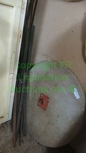 lot 74 image: Concrete wheel and metal straps