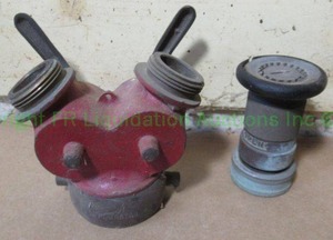 lot 79 image: Vintage fire siamese and fire hose nozzle