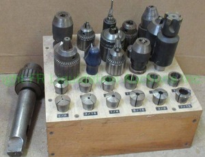 lot 195 image: Drill bit chuck head set
