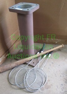 lot 102 image: Metal table base, baseball bat and badmitten rackets