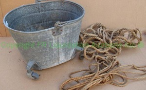 lot 305 image: Galvanized metal mop bucket and rope