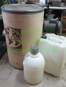 lot 312 image: Storage barrel and plastic storage bottles