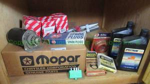 lot 48 image: Assorted auto parts including Mopar, AC Delco and others