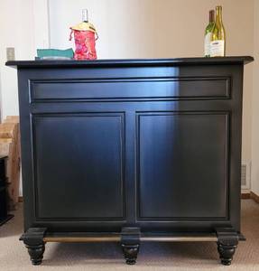 lot 1 image: 48 W x 20 D x 42 H HOME BAR WITH WINE STORAGE AND MORE IN STYLE, COLOR, AND CONDITION SHOWN. SEE PICTURES CONTENTS SEEN NOT INCLUDED
