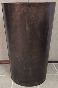 lot 4 image: EXTRA LARGE SIZE 23.5 DIA x 36 H METAL PLANTER IN STYLE, COLOR, AND CONDITION SHOWN.