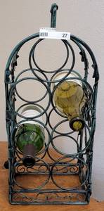 lot 27 image: METAL WINE HOLDER IN STYLE, COLOR, AND CONDITION SHOWN. BOTTLES NOT INCLUDED.