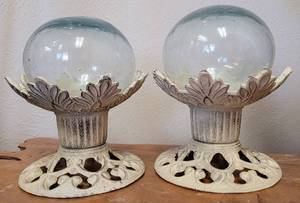 lot 32 image: LOT OF 2 CAST IRON STANDS WITH HAND BLOWN GLASS GLOBES AS SHOWN. (YOUR BID X 2)