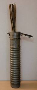 lot 35 image: TALL 4.75 W x 25 H METAL CAN STYLE CONTAINER  VASE WITH CONTENTS IN STYLE, COLOR, AND CONDITION SHOWN.