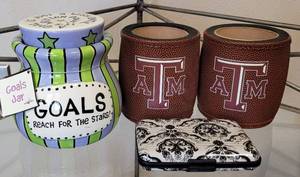 lot 39 image: TEXAS A&M KOOZIES, WALLET, AND MORE AS SHOWN.