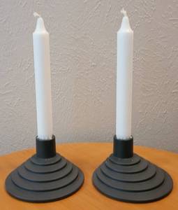 lot 40 image: PAIR OF IKEA CANDLE STICK HOLDERS WITH CANDLES IN STYLE, COLOR, AND CONDITION SHOWN.