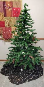 lot 71 image: CHRISTMAS TREE WITH DECORATIONS AND TREE SKIRT AS SHOWN.