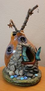 lot 98 image: SCULPTED FAIRY HOUSE DECOR IN STYLE, COLOR, AND CONDITION SHOWN. 9 W x 11.5 D x 11 H
