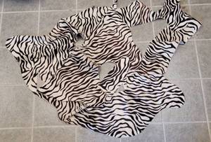 lot 101 image: ZEBRA COWHIDE AS SHOWN.