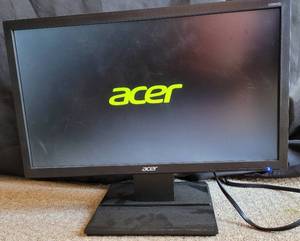 lot 112 image: ACER COMPUTER MONITOR MODEL V206HQL AS SHOWN. TESTED AND POWERS ON.