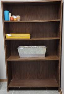 lot 143 image: 4-TIER BOOK CASE IN STYLE, COLOR, AND CONDITION SHOWN. CONTENTS NOT INCLUDED 36 W x 12 D x 60 H