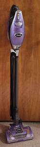 lot 148 image: SHARK ROCKET DELUXE PRO CORDED STICK VACUUM AS SHOWN. TESTED AND POWERS ON.