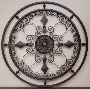 lot 151 image: 28 DIA ROUND IRON WALL HANGING DECOR IN STYLE, COLOR, AND CONDITION SHOWN.