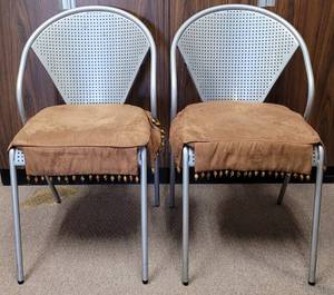 lot 157 image: LOT OF 2 METAL SILVER CHAIRS IN STYLE, COLOR, AND CONDITION SHOWN. CUSHIONS INCLUDED. (YOUR BID X 2)