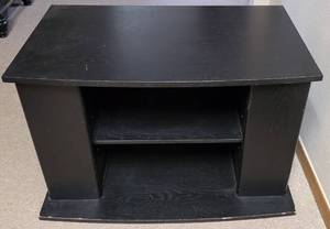 lot 188 image: TV  MEDIA CENTER IN STYLE, COLOR, AND CONDITION SHOWN. 31.5 W x 19.25 D x 19.25 H