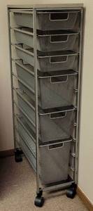 lot 196 image: 6 MESH BASKET OFFICE CART WITH ROLLERS IN STYLE, COLOR, AND CONDITION SHOWN. 10 W x 21.25 D x 44 H