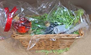 lot 241 image: WRAPPED GIFT BASKET AS SHOWN.