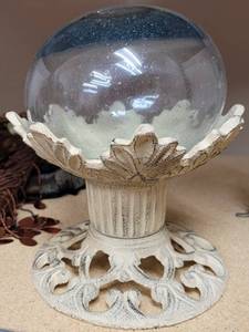 lot 268 image: CAST IRON STAND WITH HAND BLOWN GLASS GLOBE AS SHOWN.