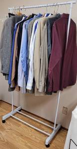 lot 277 image: CLOTHES RACK WITH MENS CLOTHING IN STYLES, COLORS, AND CONDITION SHOWN. TAKE A LOOK