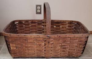 lot 324 image: LARGE SIZE29 W x 18.25 D x 17.5 H WOOVEN BASKET IN STYLE, COLOR, AND CONDITION SHOWN.