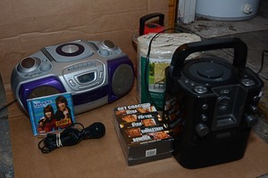 lot 89 image: Stereo with cd player with microphone (made for IPOD), Emerson cd player with multi-angle surround system, swing cover, & lantern