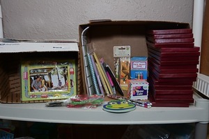 lot 15 image: Assorted notebooks, picture frames, pencils, crayons, & other supplies
