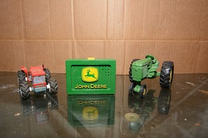 lot 213 image: Green John Deere toy tractor & red toy tractor