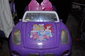 lot 294 image: Disney princess Pontiac battery operated Power Wheel car