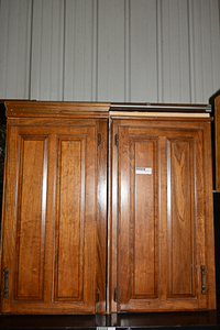 lot 228 image: Upper kitchen or bathroom cabinet in natural wood stain