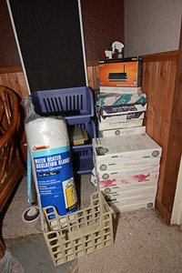 lot 24 image: Frost King water heater insulation blanket, 11 X 17 multi-purpose printer paper, & storage shelves