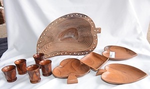 lot 38 image: Monkeypod Wooden serving pieces Including Unique Collapsible Center Piece Bowl