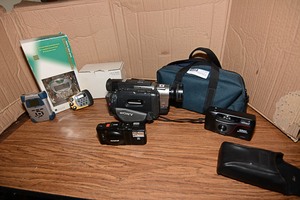 lot 59 image: Sony Handycam Vision video camera with 4 LCD built-in monitor, Nikon SmileTaker camera, & 3 projection alarm clocks
