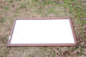 lot 86 image: Glass mirror with wooden frame