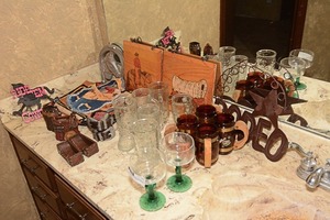 lot 88 image: Western-themed collectables including boot-shaped mugs & margarita glasses with cactus handles