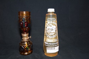lot 128 image: Oil Lamp with fresh wick, Vanilla Bean Lamp Oil Filler in Bottle