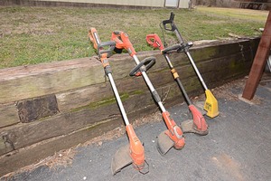 lot 411 image: 4 Weed Eaters Two are Electric and Two are Battery Powered