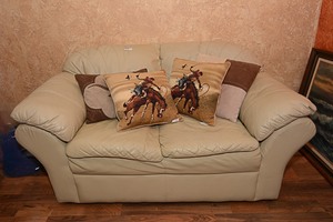lot 161 image: Tan love seat with throw pillows