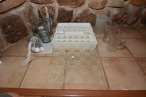 lot 148 image: Shot-glass themed checker board with shot glasses as checker pieces & beer pitchers